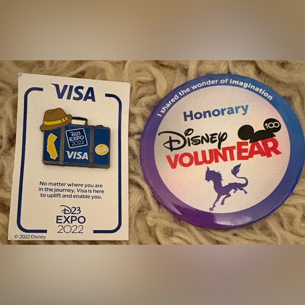 Disney D23 Expo 2022 Visa Pin and Honorary VoluntEAR Button